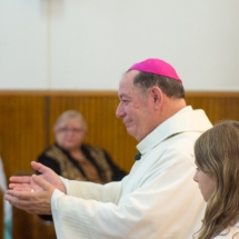 Bishop Colli receiving gifts